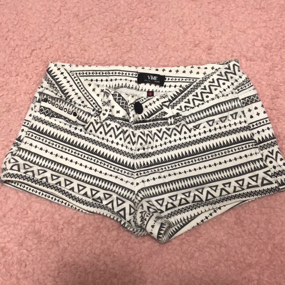 white and black tribal print shorts